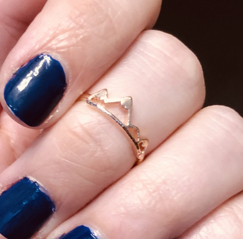 Rose gold color mountains midi ring, available at www.lanternandwren.com.