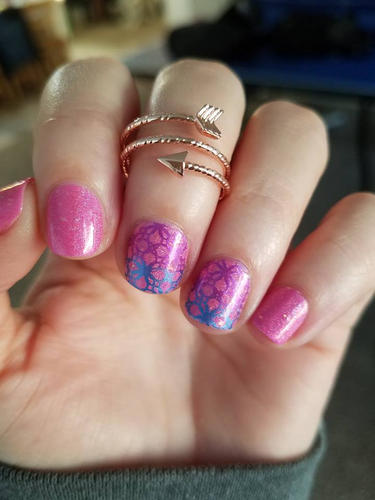 Rose gold arrow midi ring, available at www.lanternandwren.com.