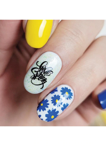 Uber Chic Hello Spring nail stamping plate. A stamping plate full of springtime images! Get yours at www.lanternandwren.com.