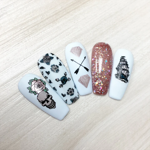 Clear Jelly Stamper Tattoo nail stamping plate. Available at www.lanternandwren.com.