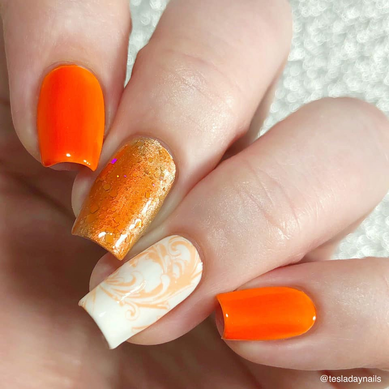 What nail color could go with a red /orange dress to a formal dinner? -  Quora