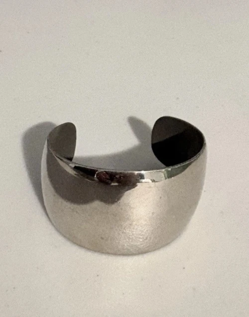 Park lane 1 1/2" wide 6 1/2" modernist silver tone cuff bracelet. Pre-owned in excellent condition