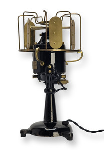 Circa 1912 Menominee Vertical Axis Tab Base Brass "Teller" Desk Fan Circa 1912 Menominee Vertical Axis Tab Base Brass "Teller" Desk Fan