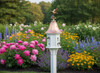 Vinyl birdhouse with copper roof and hummingbird weathervane 