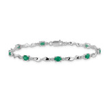 14k White Gold Complete Diamond and Oval Emerald Twisted Link 7 inch Bracelet