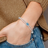 14k White Gold Complete Emerald-cut Blue Topaz and 1/10 carat Diamond Halo Hinged Bangle Bracelet