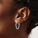 Sterling Shimmer Sterling Silver Rhodium-plated 1.3mm CZ 48 Stone Oval In and Out Hinged Oval Hoop Earrings