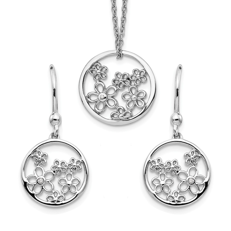 Delicate sterling silver rhodium-plated set featuring openwork floral designs accented with sparkling diamonds.
