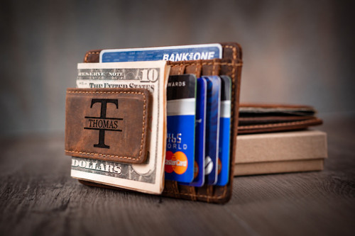 Custom engraved men's leather money clip wallet made from genuine brown Crazy Horse leather, featuring a personalized monogram, magnetic cash clip, and multiple credit card slots. A slim front-pocket wallet that makes a great Christmas gift for husband, anniversary gift for boyfriend, or personalized birthday gift for him.
