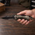 Comfortable Full-Size Design — Shown in an adult man’s hand to demonstrate the knife’s size, shape, and substantial handle.