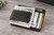 Personalized men's leather money clip wallet engraved with custom GPS coordinates. Unique anniversary gift for husband, boyfriend or groom, with a slim design for carrying cash and credit cards.
