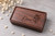 Custom engraved walnut jewelry box showing a personalized name, floral design and optional heartfelt message under the lid.