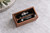 Personalized walnut wedding ring box with clear glass lid, custom UV-printed wedding design, and black velvet interior. This quad wooden ring holder accommodates 2–4 rings and is ideal for wedding ceremonies, ring bearers, and personalized wedding keepsakes.