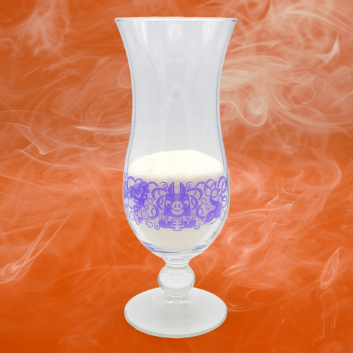 Drinking glass with a purple design printed on it.