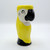 A yellow parrot shaped ceramic drinking glass