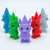 Multicolored figurines of animals wearing hats and capes
