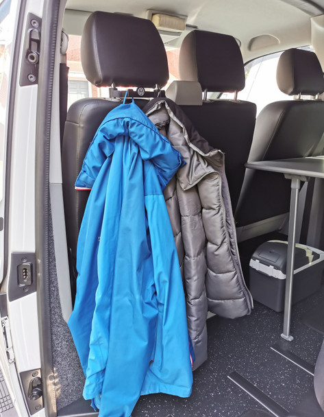 Enhance your VW T5 experience with our innovative Headrest Hooks. Crafted from durable ABS, they offer style and strength for all your storage needs.