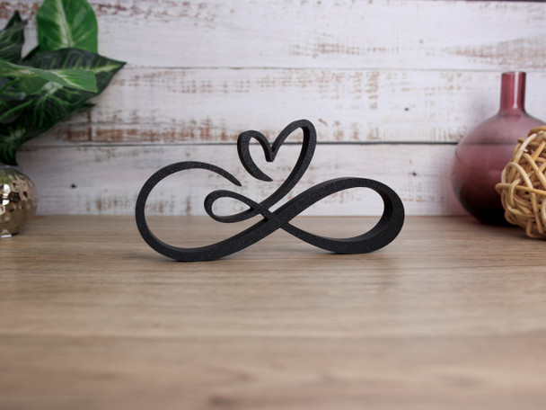 Transform your decor with our Infinity Heart sculpture, a sleek, eco-friendly piece that symbolizes an unbreakable bond. Custom colors available to match your style!