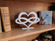 3D printed infinity heart — eco‑friendly PLA heart‑infinity symbol sculpture for shelves, desks, nurseries.