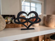 Modern infinity heart sculpture — sleek minimalist ornament for living rooms, bedrooms, offices, and entryways.
