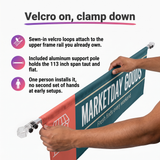 Custom tent half wall being attached by hand with velcro loops, support pole and single-person setup.