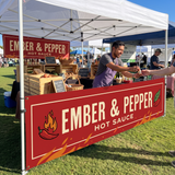 Custom tent half wall on a food vendor's ten foot canopy at a busy farmers market.