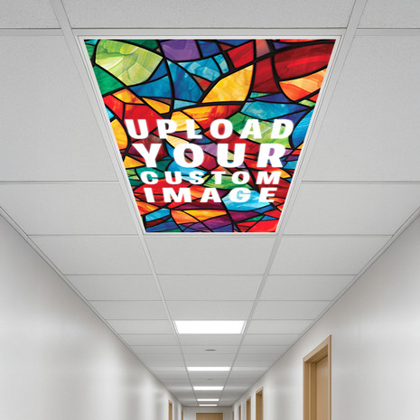Custom Light Diffuser Panel 2x4 – Premium polycarbonate ceiling panel with full-color UV printing, showing vibrant custom artwork installed in a fluorescent light fixture.
