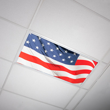 American flag fluorescent light cover installed in a 2x4 ceiling troffer