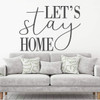 Let's Stay Home wall decal in gray on white wall