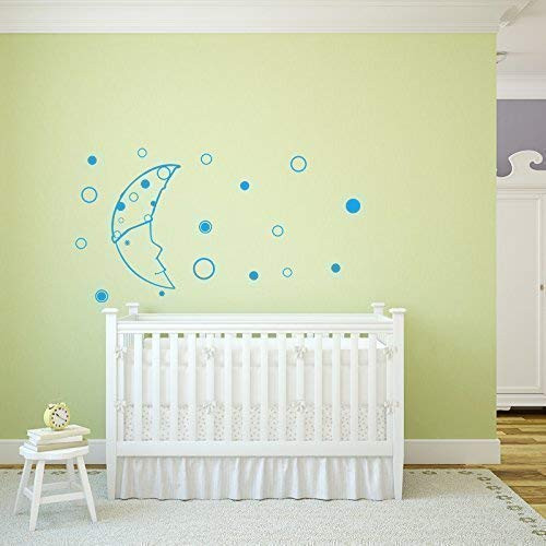 Moon and stars night-time sky decal above a nursery crib