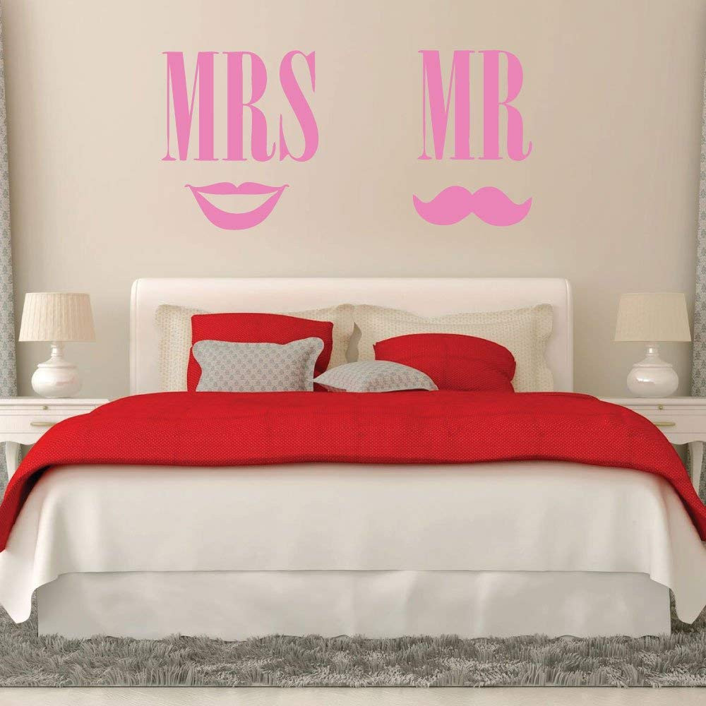 Mr and Mrs vinyl wall decal above a headboard in a bedroom