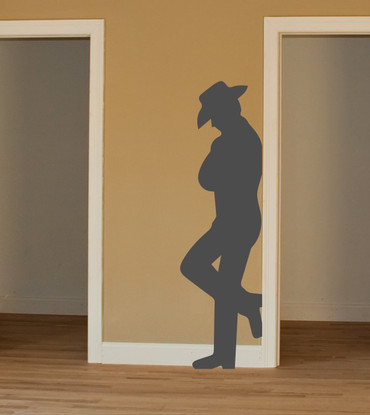 Leaning cowboy silhouette vinyl decal for western ranch and farmhouse decor