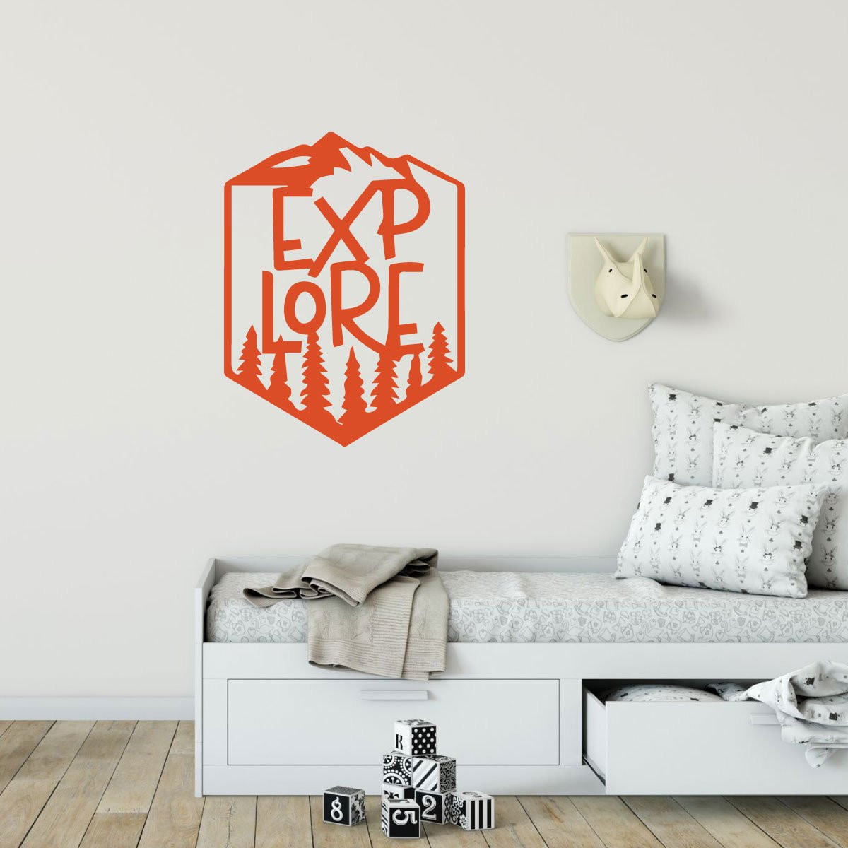 Explore hiking badge vinyl wall decal with mountains and trees in a kids bedroom