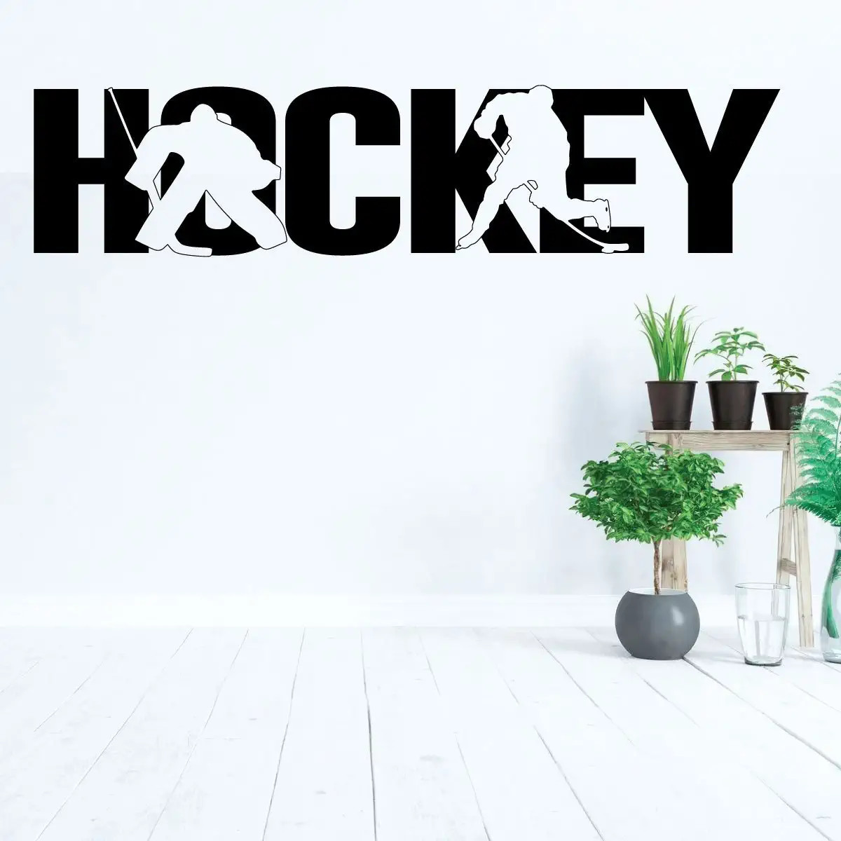 Hockey lettering wall decal with player silhouettes cut into bold text