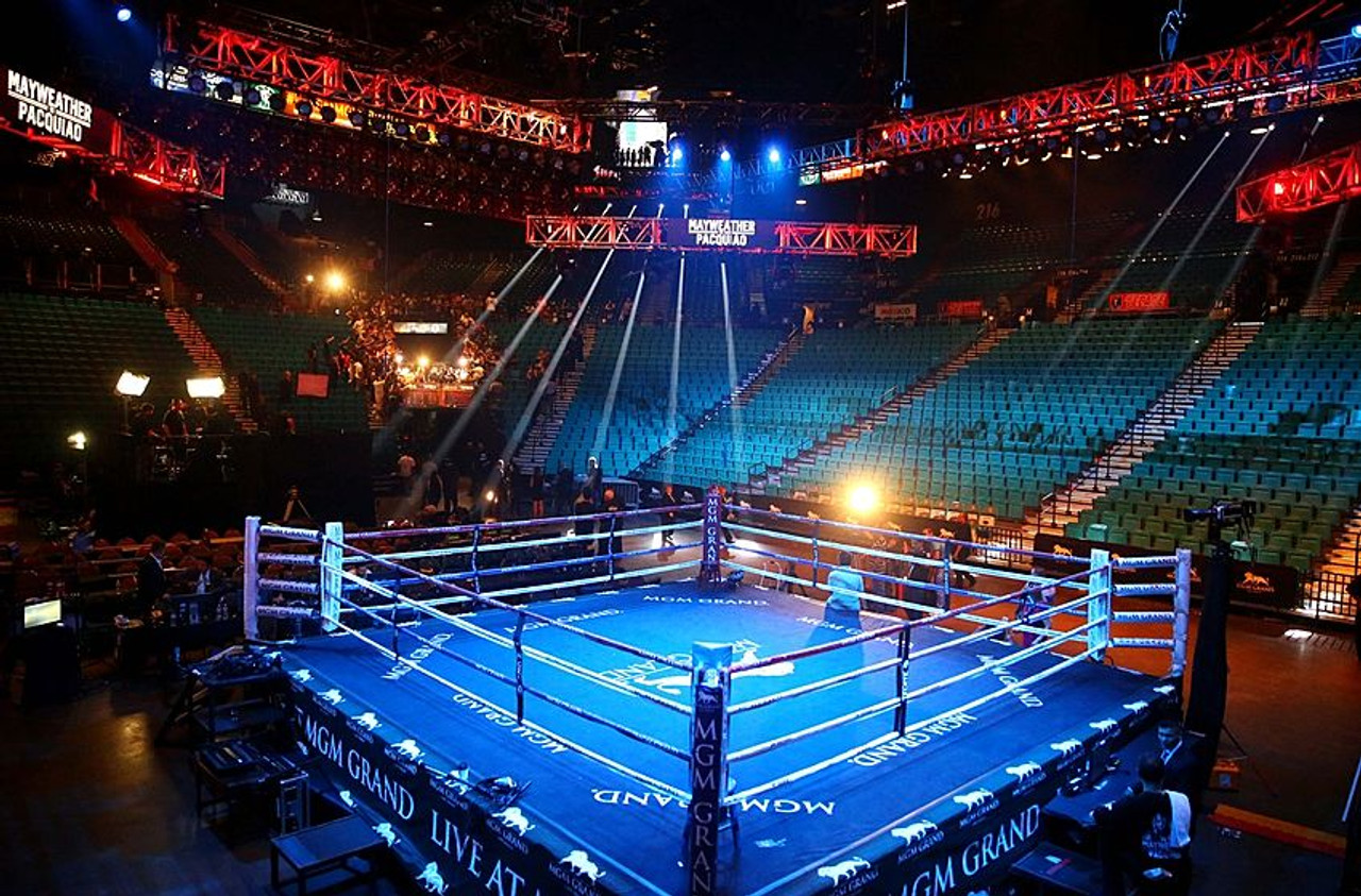 Empty Boxing Ring With Red Ropes For Match In The Stadium Arena. Creative  Artwork Decoration. Foggy Background With Light. Selective Focus Stock  Photo, Picture and Royalty Free Image. Image 119779889.