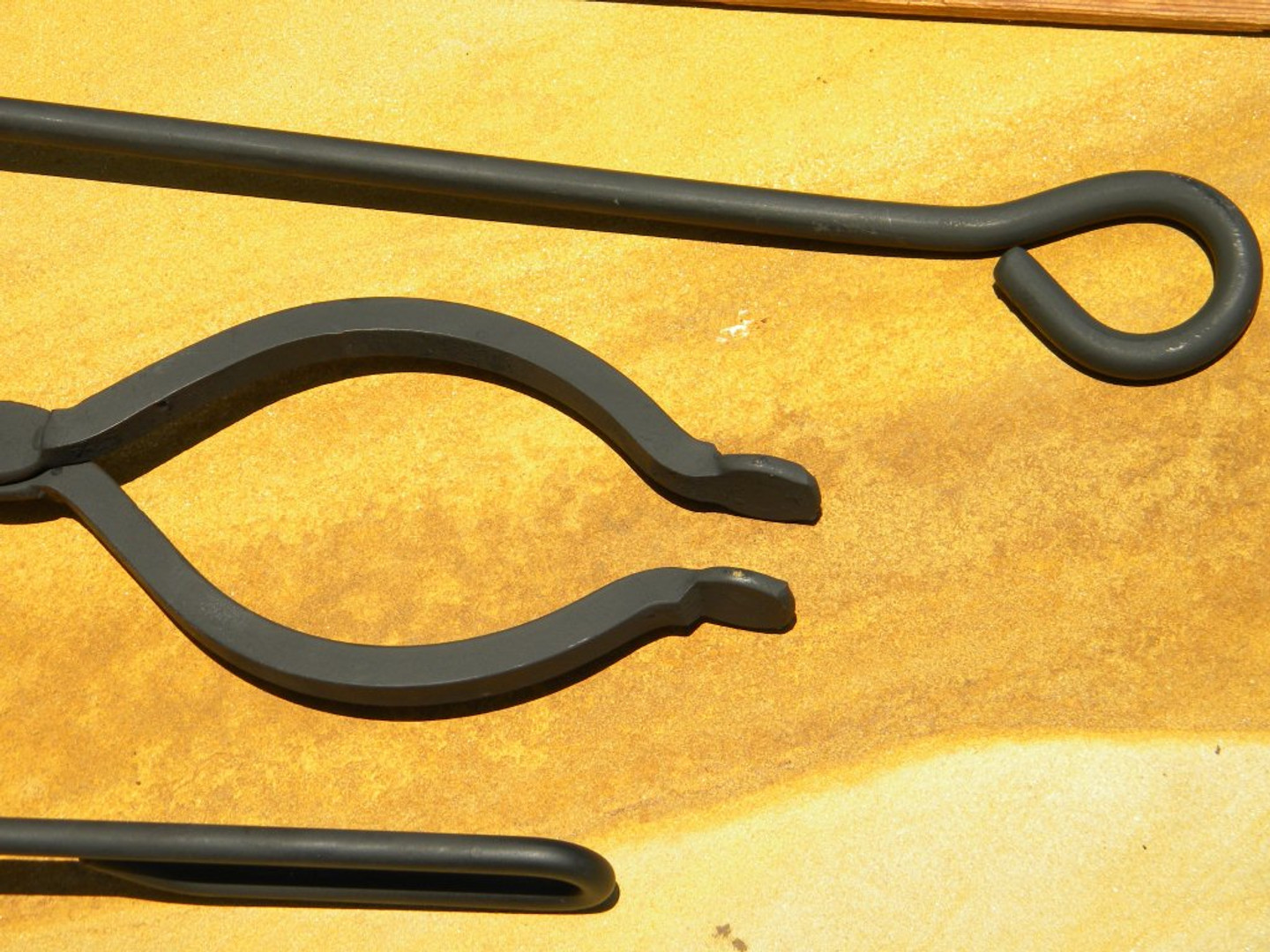 Fire Tools - This set consists of an Ash Shovel, Fire Poker and Log Tongs