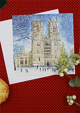 A christmas card of Westminster Abbey on a white envelope