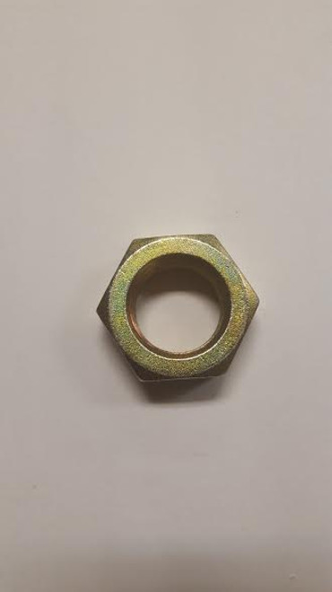 hexagonal metal nut with a 7/8 inch diameter,  threads on the inside and used to secure bolts or screws in place.