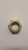 hexagonal metal nut with a 7/8 inch diameter,  threads on the inside and used to secure bolts or screws in place.