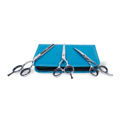 FurHQ 3-Piece Shear Set with Case - 6.5", three silver grooming shears, including thinning shears, arranged on a turquoise zippered storage case against a white background.