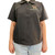 Maltias Mastergroom Short Sleeve Blouse - Black, women wearing a black short sleeve blouse with embroidered logo on the chest.