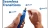 Dremel 416HP Diamond Pet Grooming Accessory, cordless rotary tool with a hand holding a small screwdriver adjusting the accessory.