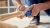 Dremel 416HP Diamond Pet Grooming Accessory, grooming a dog's paw with a portable electric tool.
