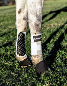 Splint Wrap in White with L53 Black & Silver Dots
(shown with Black No-Turn Overreach Boots with matching L53 leather) Splint Wrap in White with L53 Black & Silver Dots
(shown with Black No-Turn Overreach Boots with matching L53 leather)