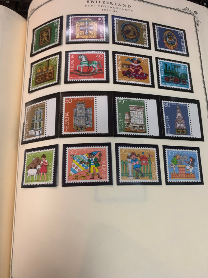 SWITZERLAND – COLLECTION IN A PAIR OF SCOTT SPECIALTY ALBUMS – 426029