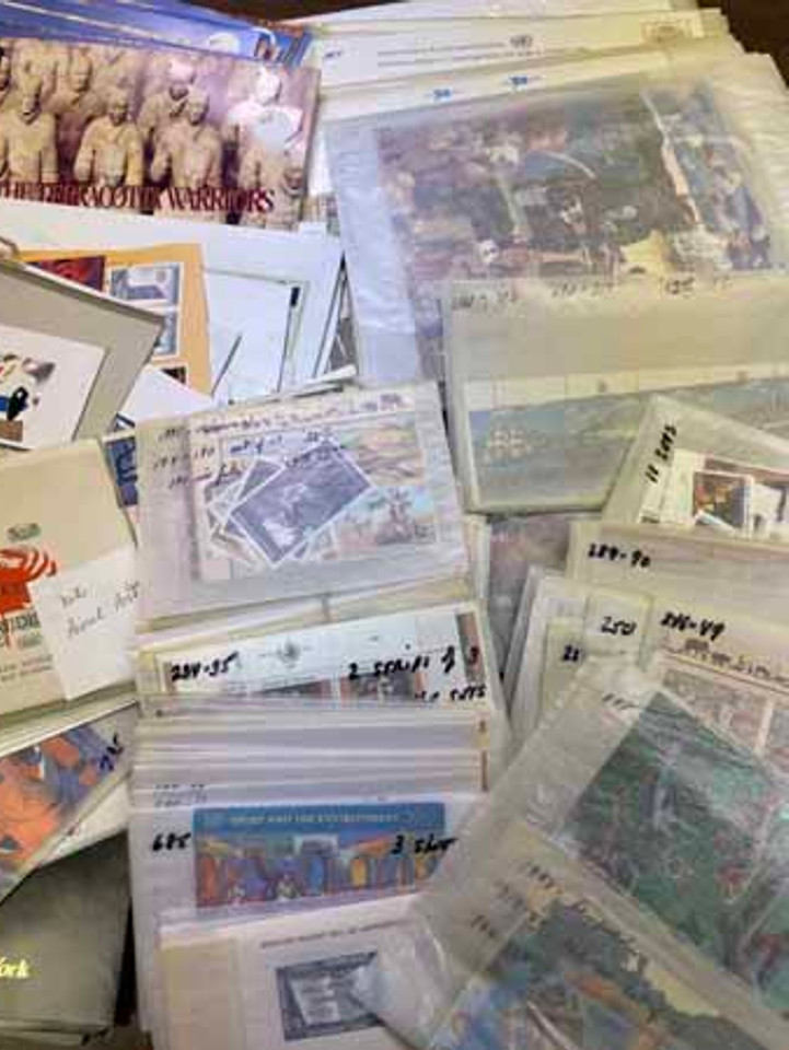 FIRST DAY COVERS, POSTAL CARDS AND STATIONERY AND UN STAMP LOT - 900209