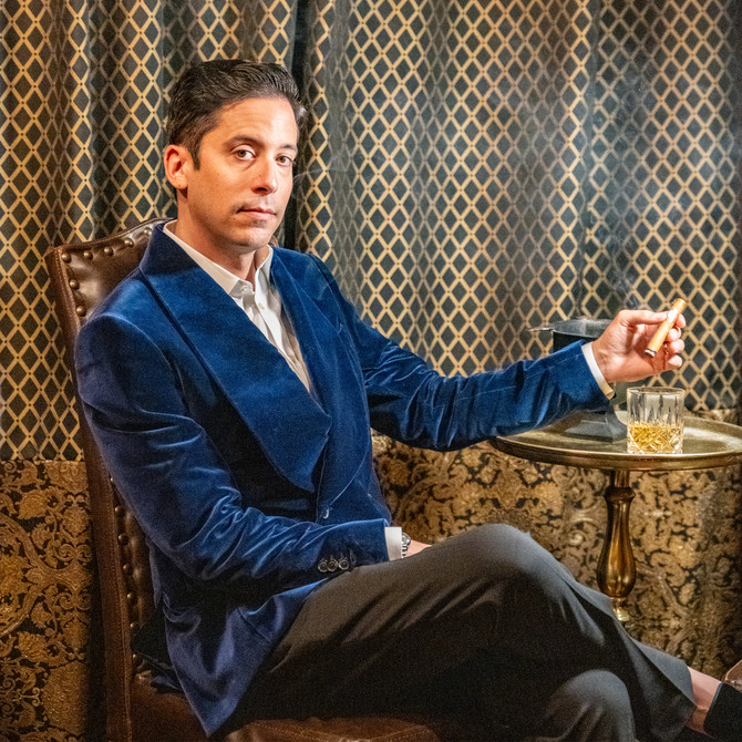 Mayflower Founder Michael Knowles wearing the Mayflower smoking jacket custom-made by Shepherd’s Menswear now available in Dream Blue.