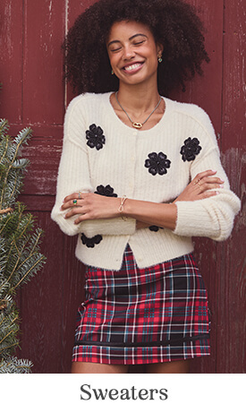 Shop sweaters and tops. Click here.