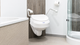 Invacare Aquatec 900 2" 4" or 6" Raised Toilet Seat with Arms and Lid