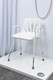 NRS Healthcare Shower Chair with Arms Comfortable Sturdy Height Adjustable